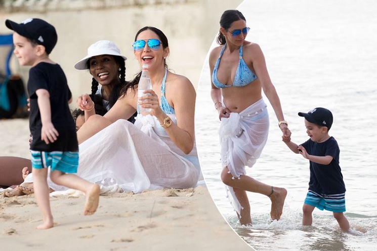 Lauren Silverman, beaming Eric Cowell and Sinitta look carefree on the beach in Barbados