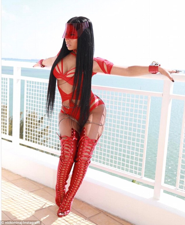 Red hot Nicki Minaj wears racy cut-out bodysuit on set of music video shot by ex lover Grizz Lee