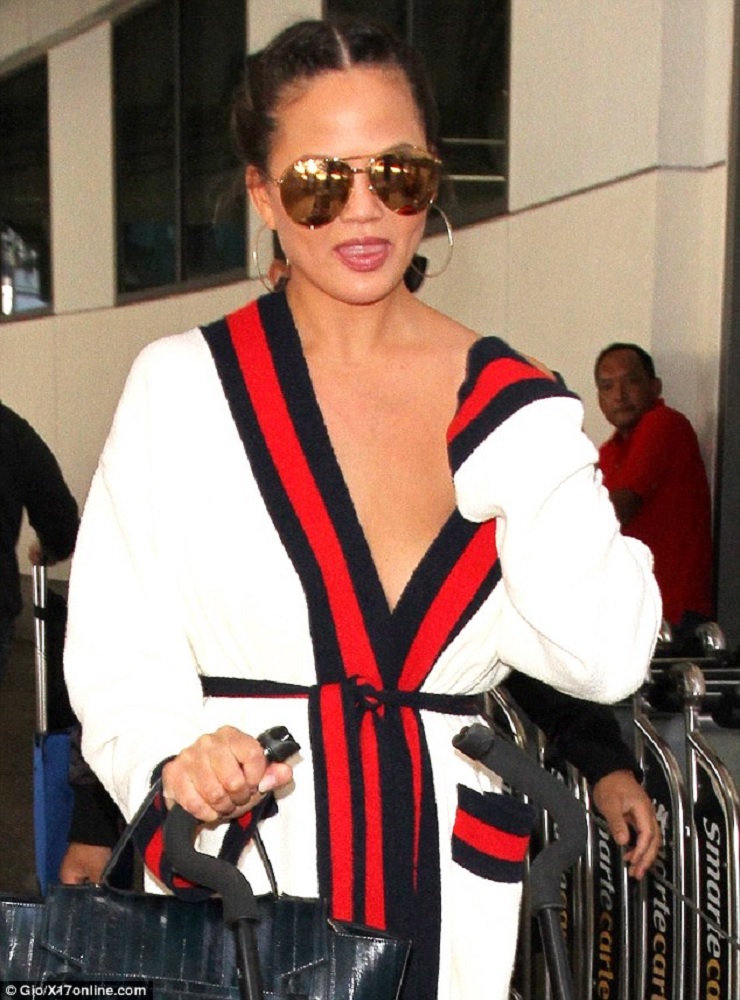 Chrissy Teigen suffers near Nip Slip in the Most Stylish Airport Outfit!