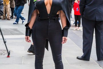 Getting comfortable! Kim Kardashian swaps sexy superhero catsuit for cosy sweats as she steps out in New York