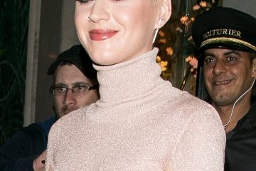 French style! Katy Perry rocks red lip color and a pretty shimmery pink dress as she dines out in Paris