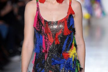 Gigi Hadid rocks a rainbow mini-dress as she and denim-clad Kaia Gerber lead the VERY colourful runway at Versace show during Milan Fashion Week