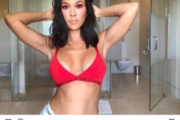 Kourtney Kardashian smolders as she showcases toned torso and cleavage in sexy red bra