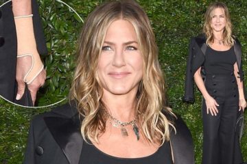 Jennifer Aniston continues to wear an arm brace but has yet to divulge the details of her